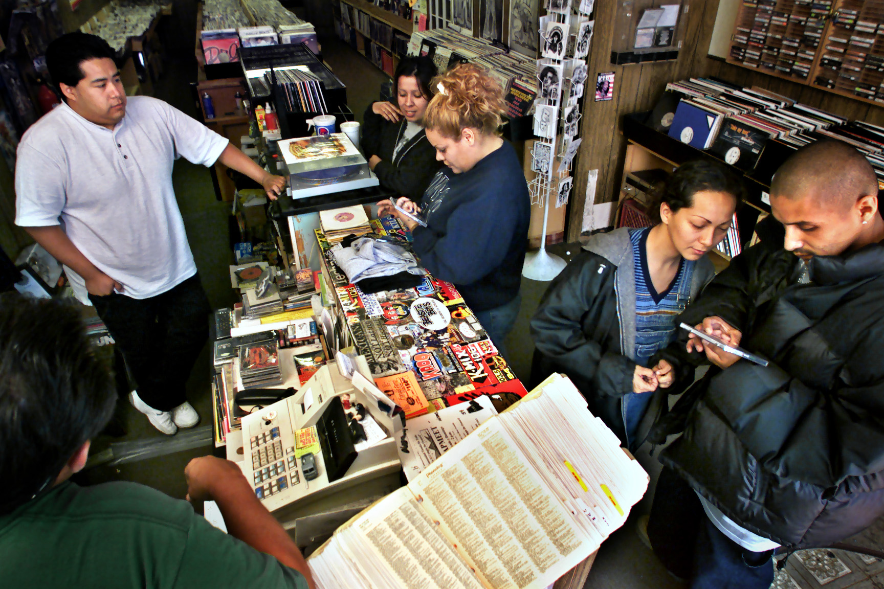 Patrons in a record store.