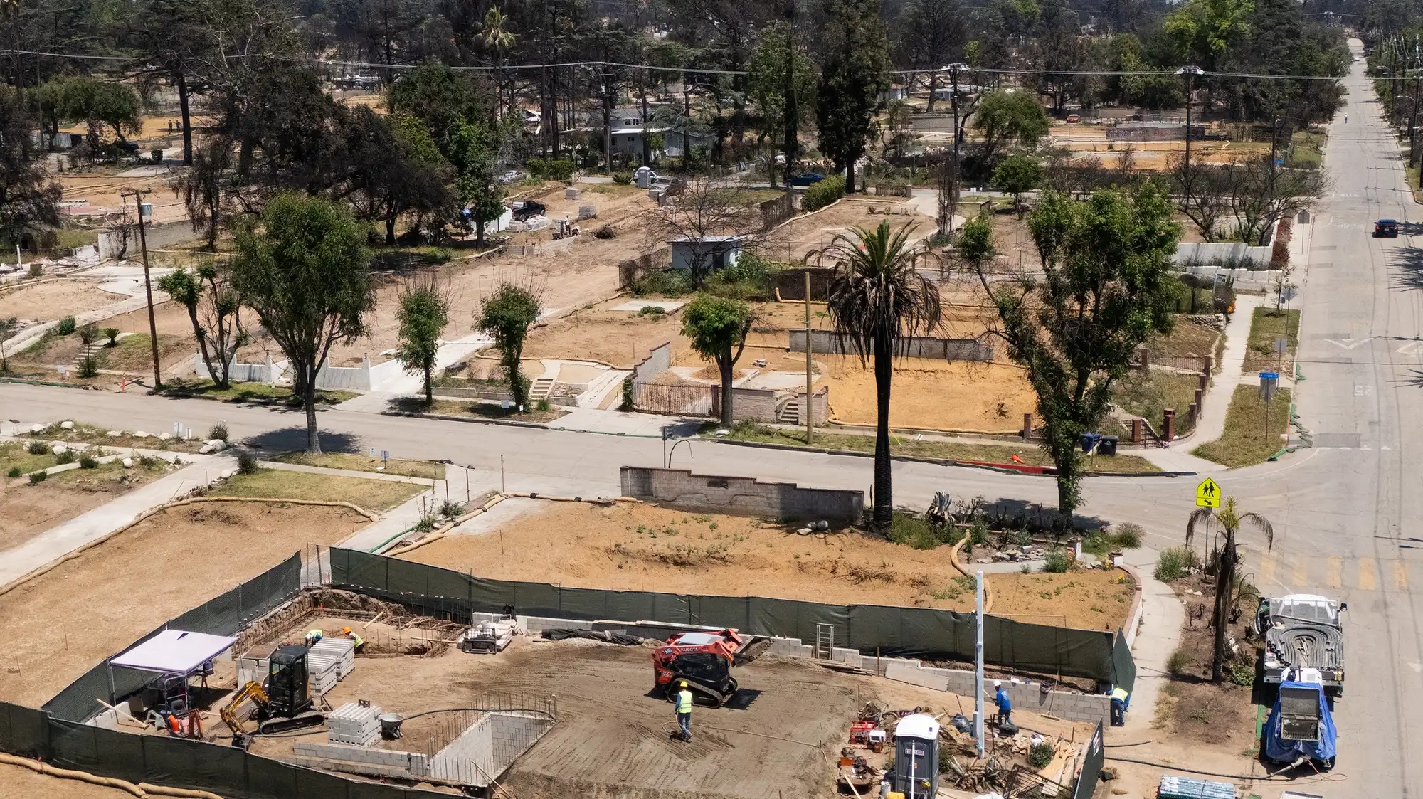 Clean up underway in Altadena last May.