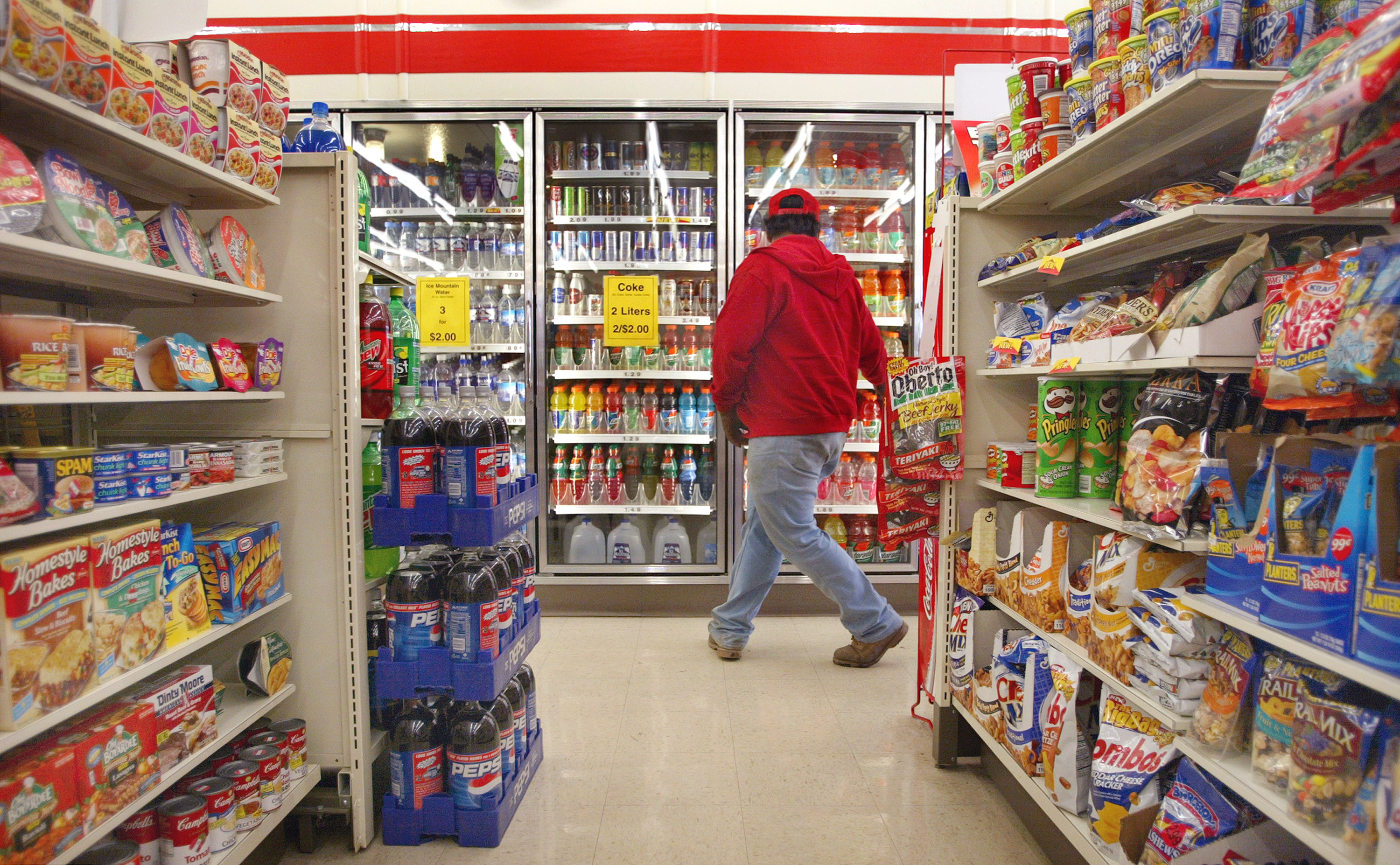 A man shops at 7-Eleven