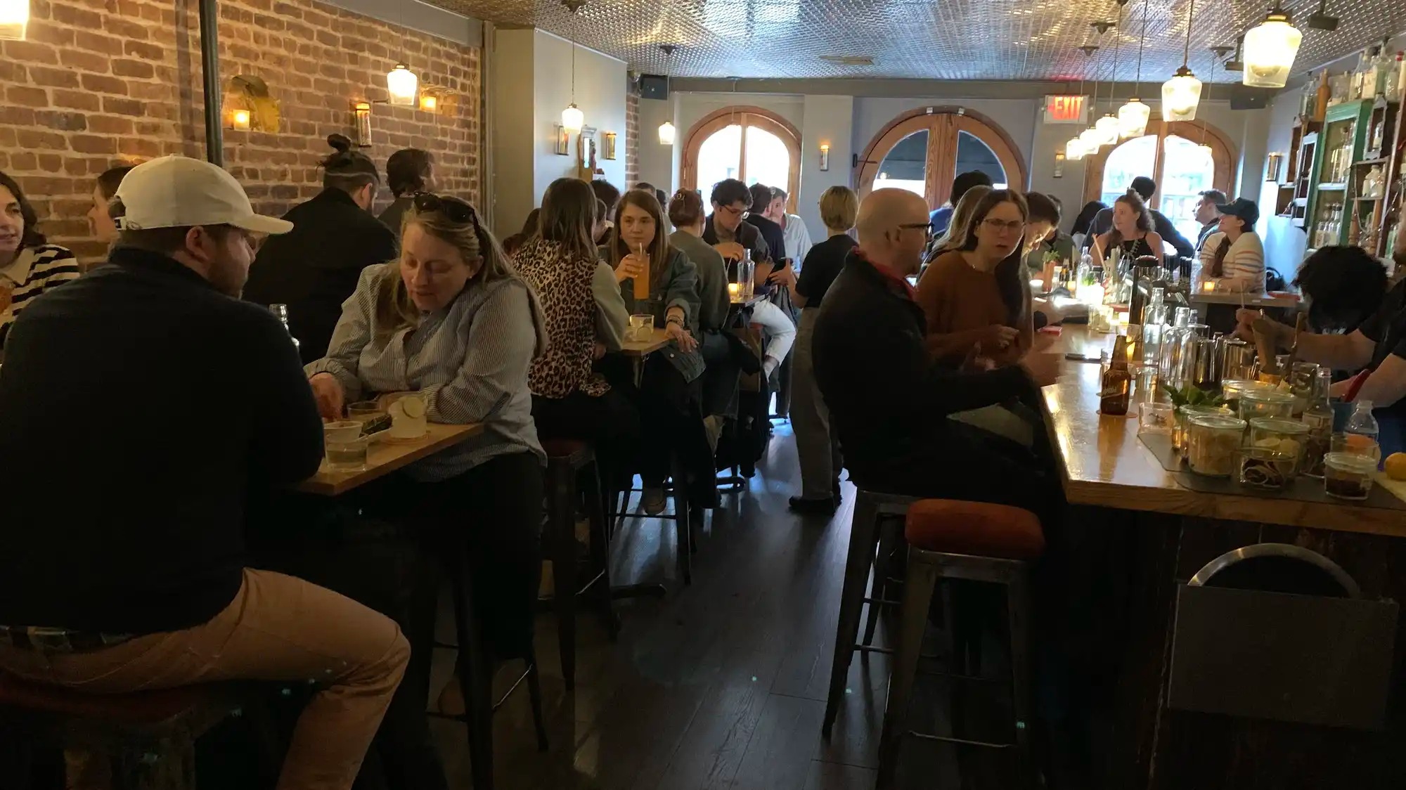 Customers eat and drink at Leyenda in Brooklyn, New York, which closed after 10 years. More eateries are shutting down due to high costs and economic uncertainty. 