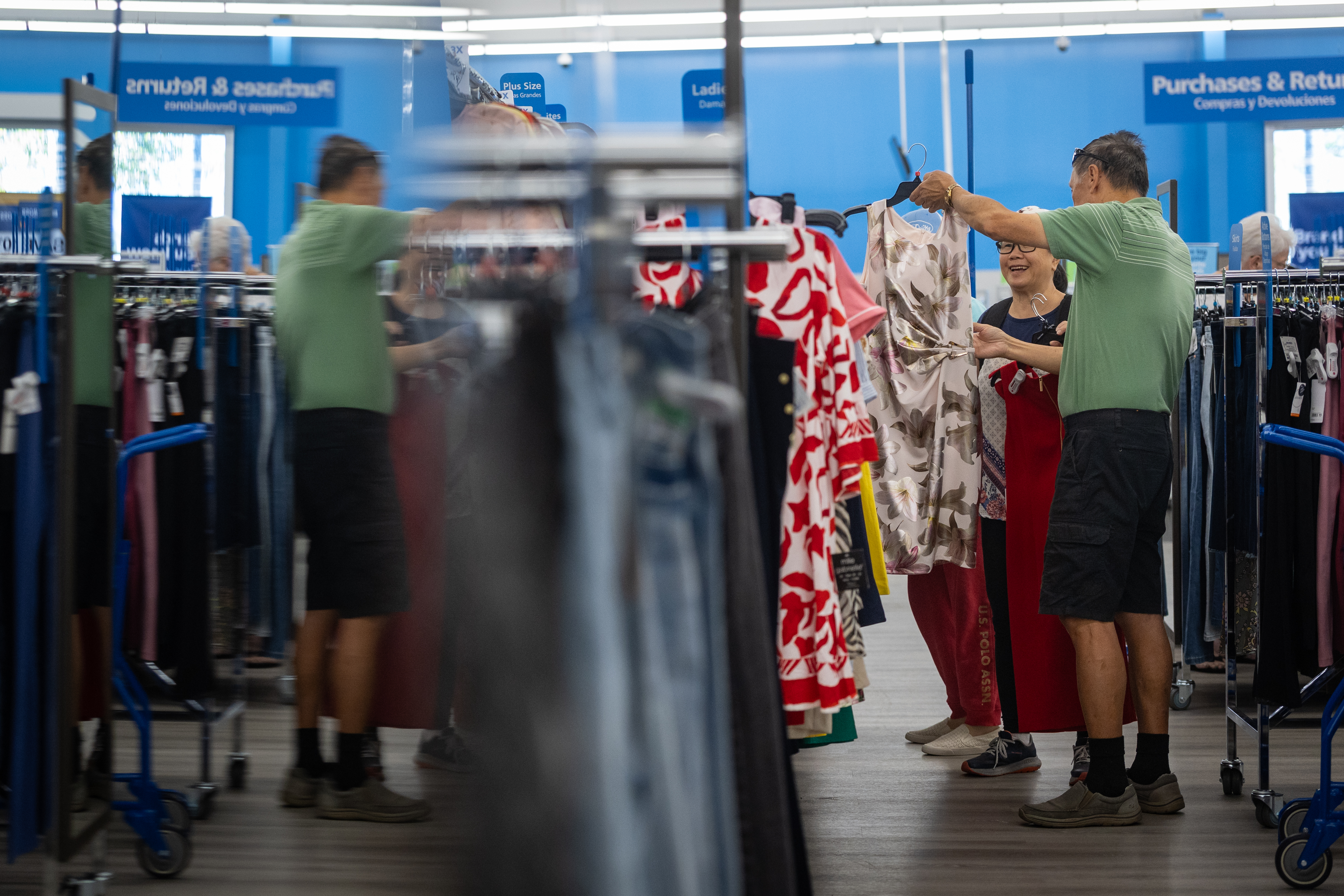 People shopping for dresses