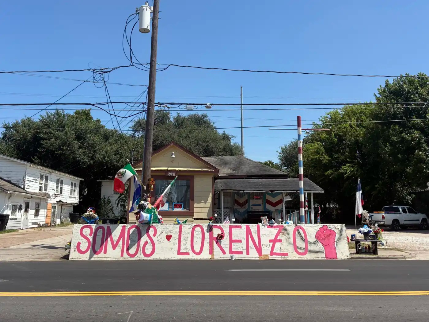 A memorial on a street in Houston reads 