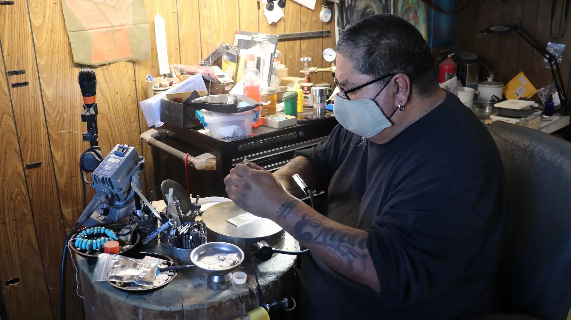 A silversmith at work.