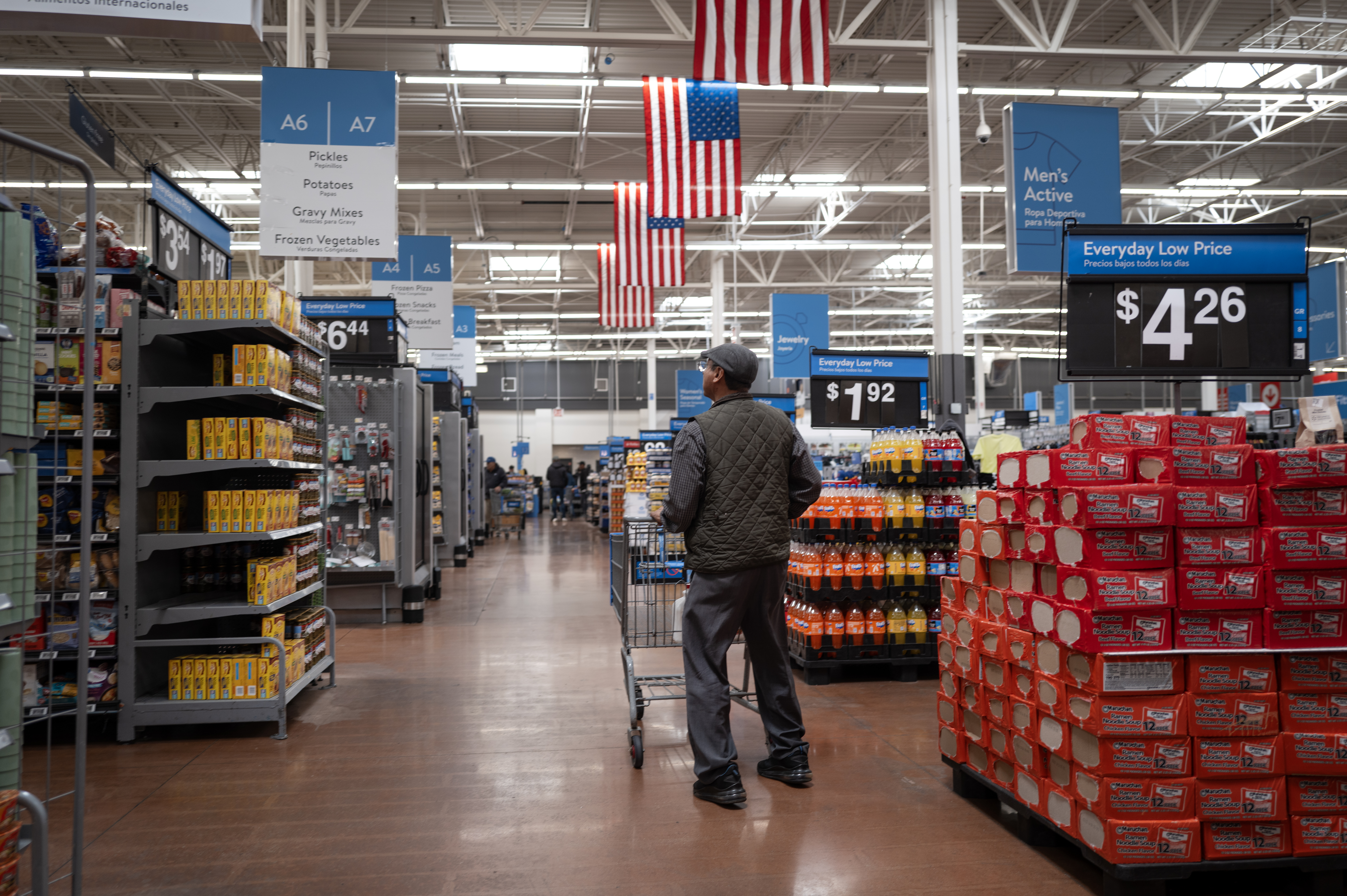 A man shops at a Walmart store.