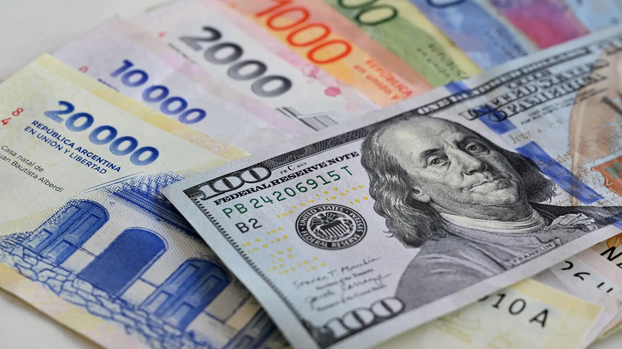 A photo illustration of dollars and pesos.