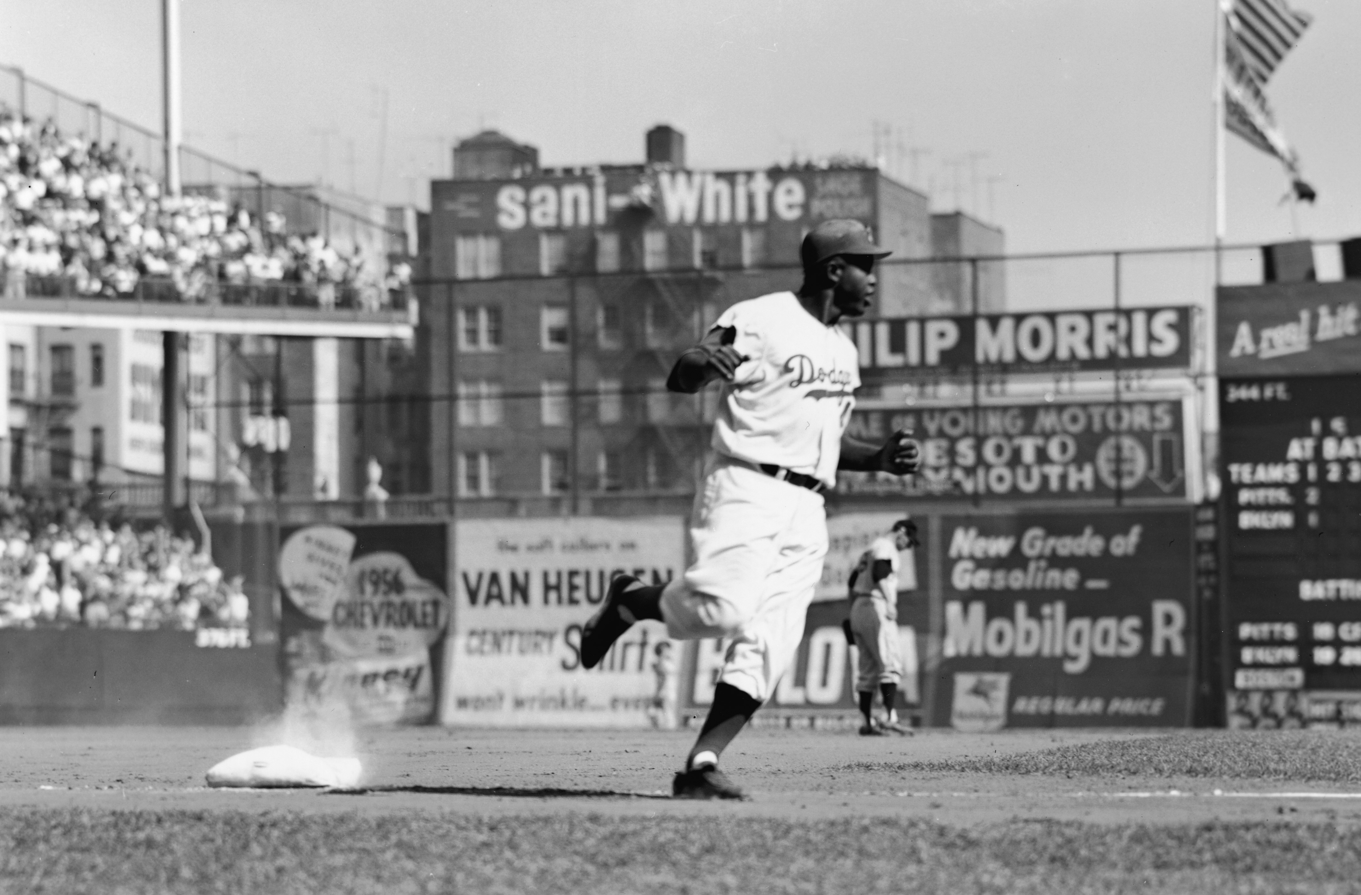 A photo of Jackie Robinson rounding the bases at New York's Ebbets Field in the 1950s.