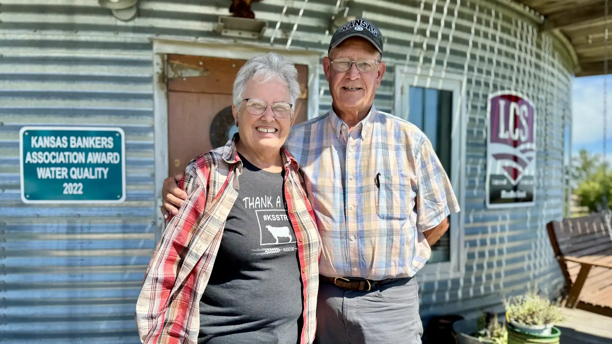 An older couple poses for a portrait