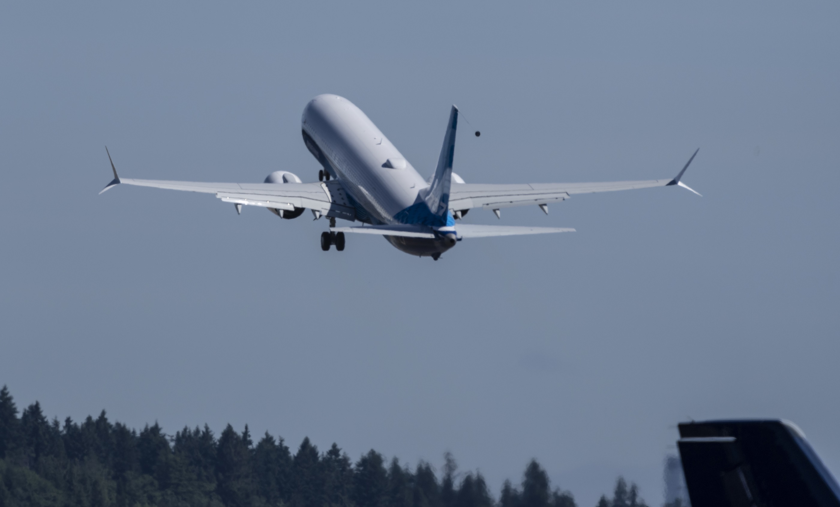 A Boeing jet takes off from the airport.