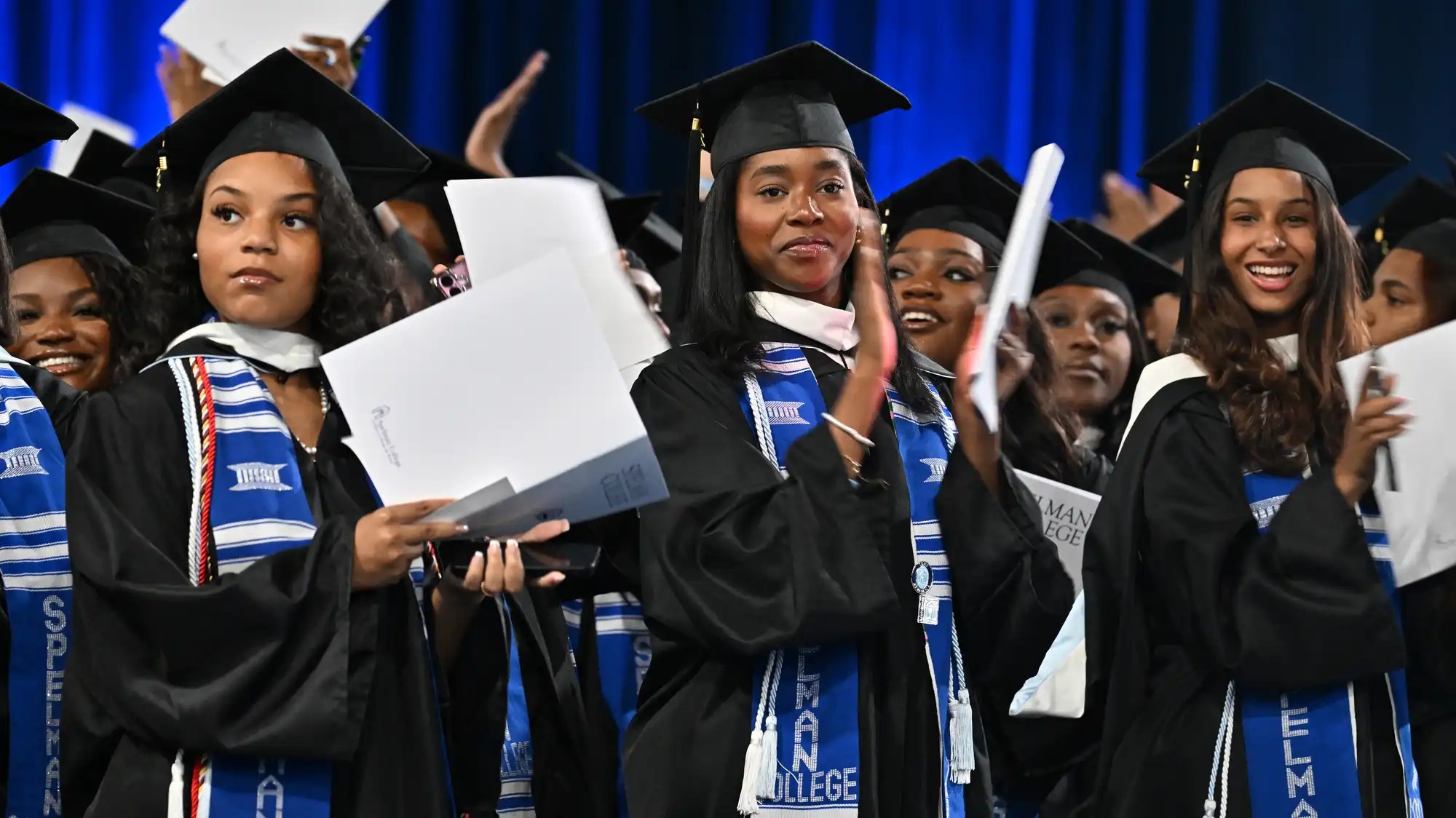 Graduates at a ceromony.