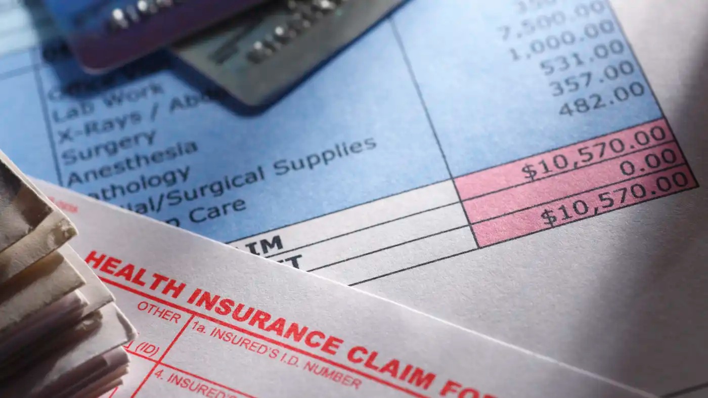 A photo illustration showing medical bills.