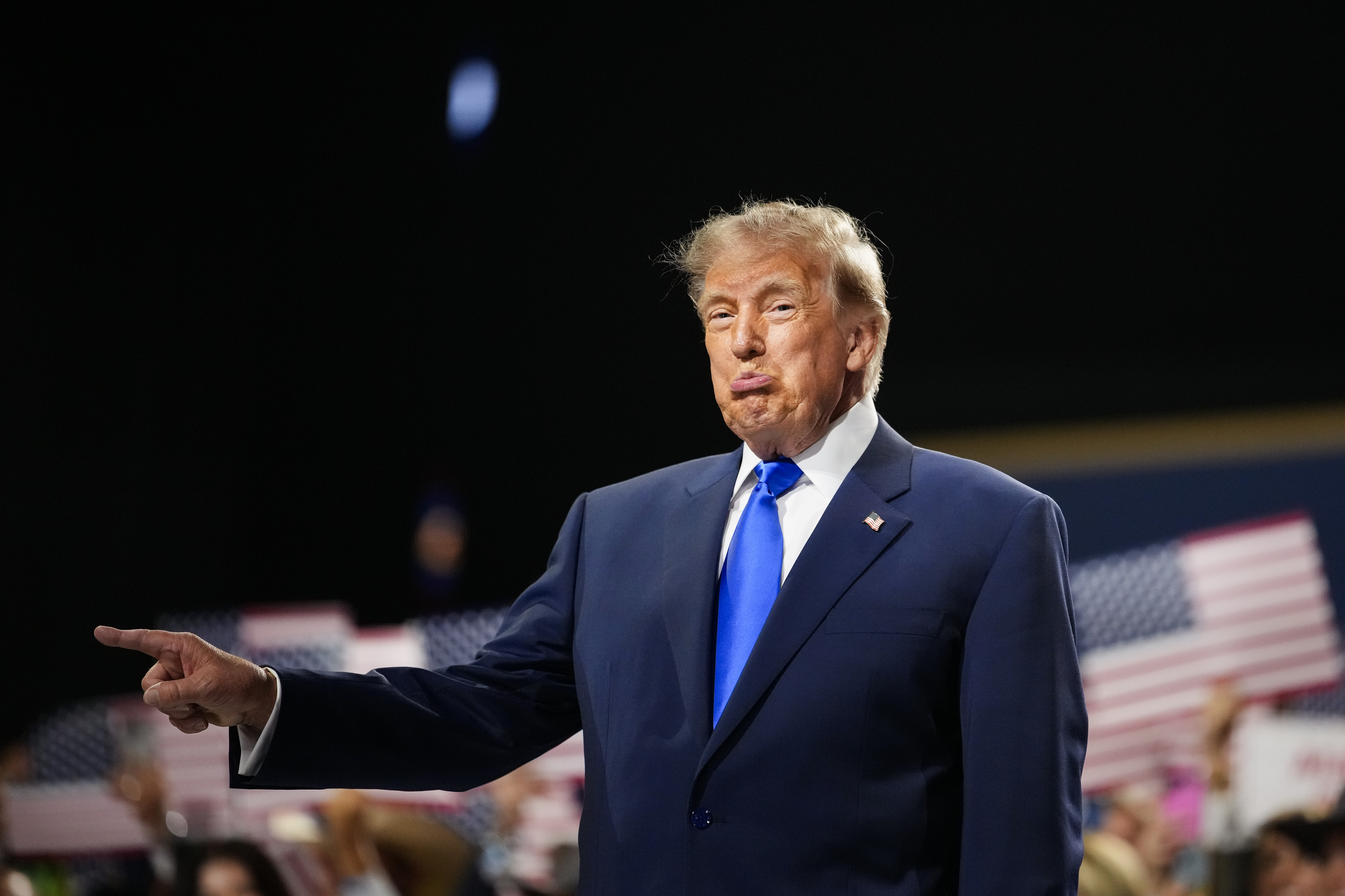 President Donald Trump onstage at a recent convention in Dallas.