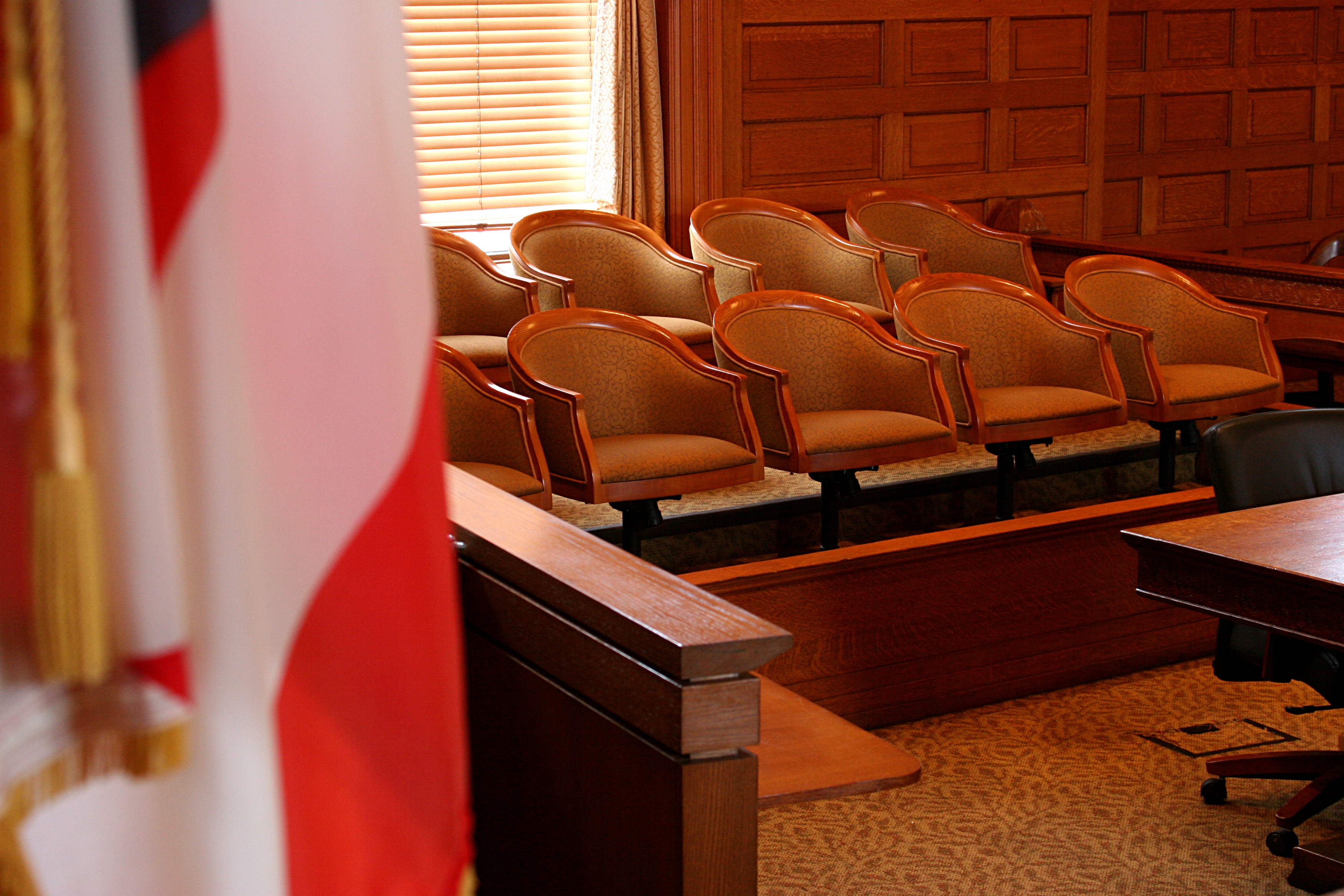 A juror box in a courtroom.