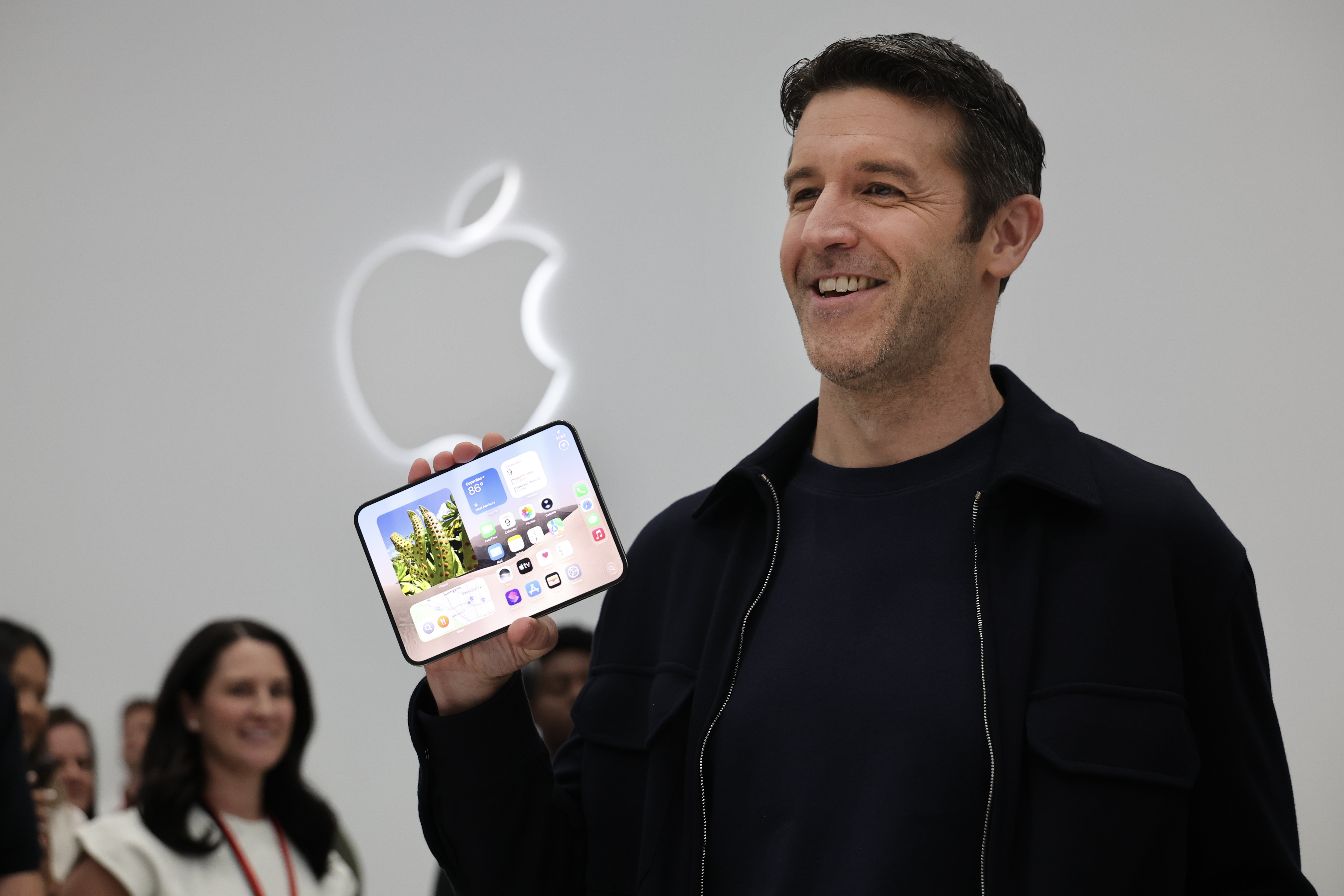 Apple CEO John Ternus with the iPhone Duo