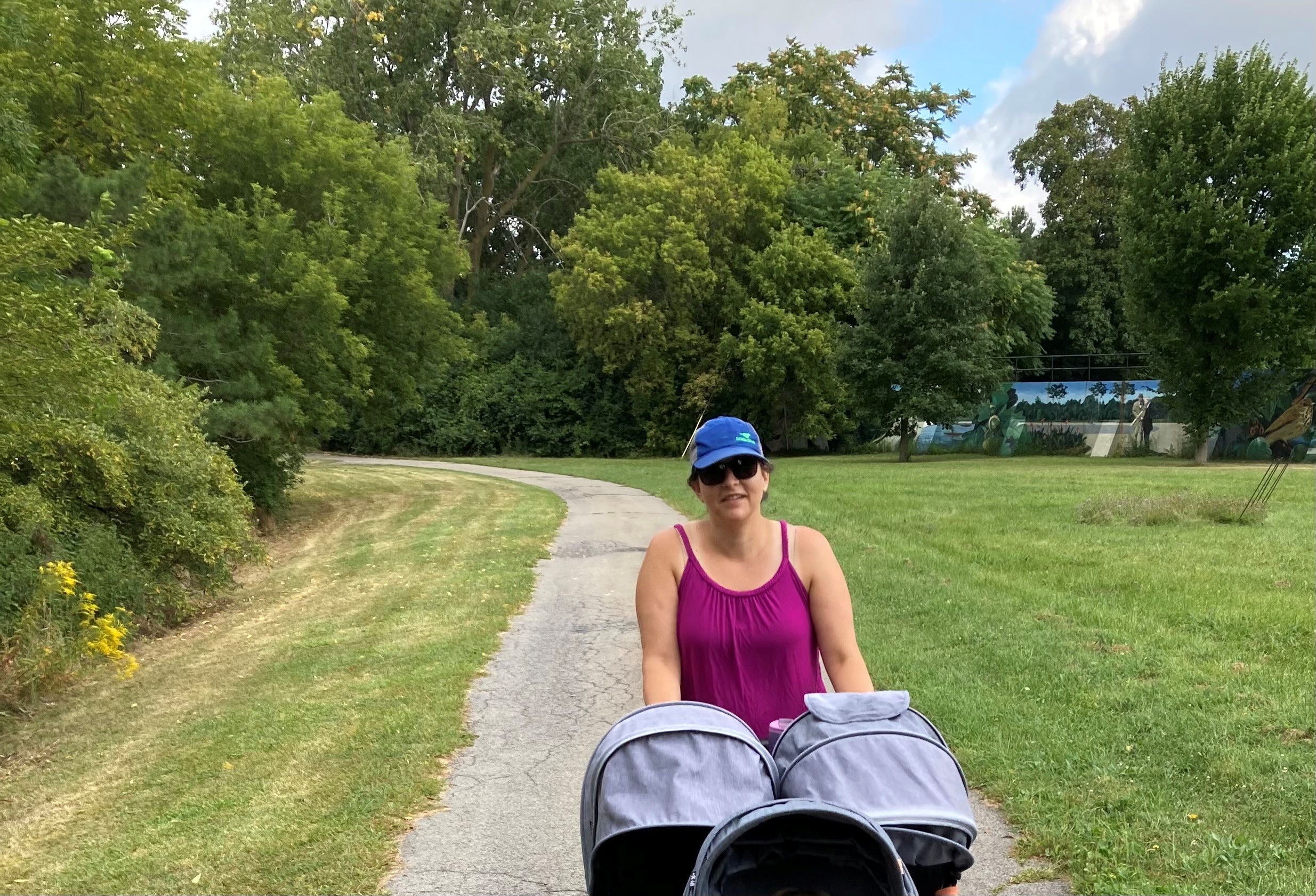woman pushing stroller