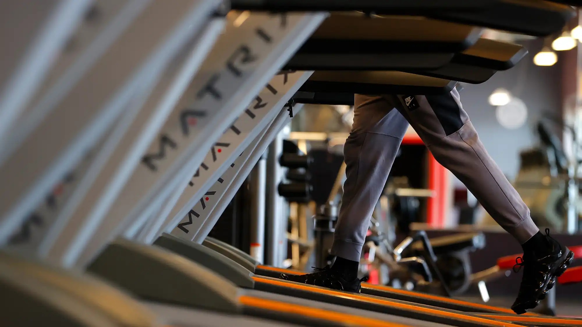 A person walking on a treadmill.