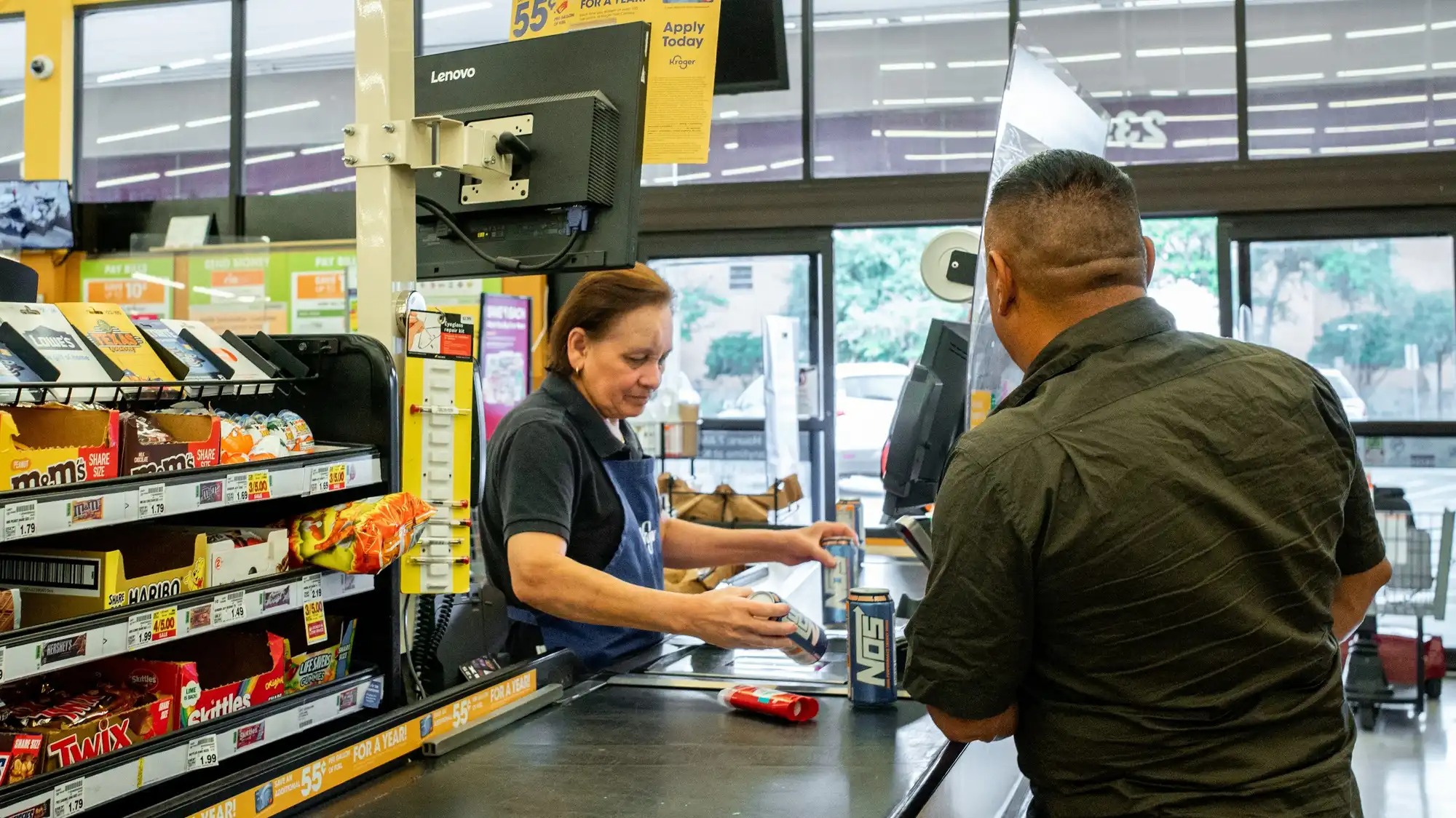 A clerk works at a supermarket