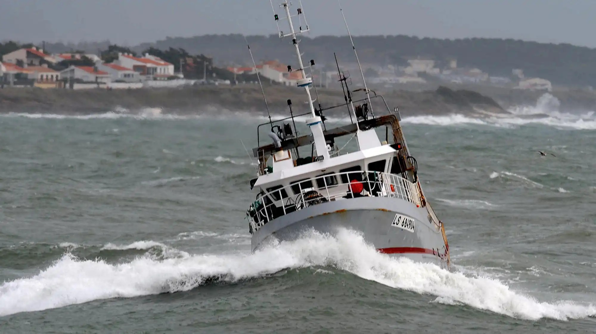 A boat on choppy waters.