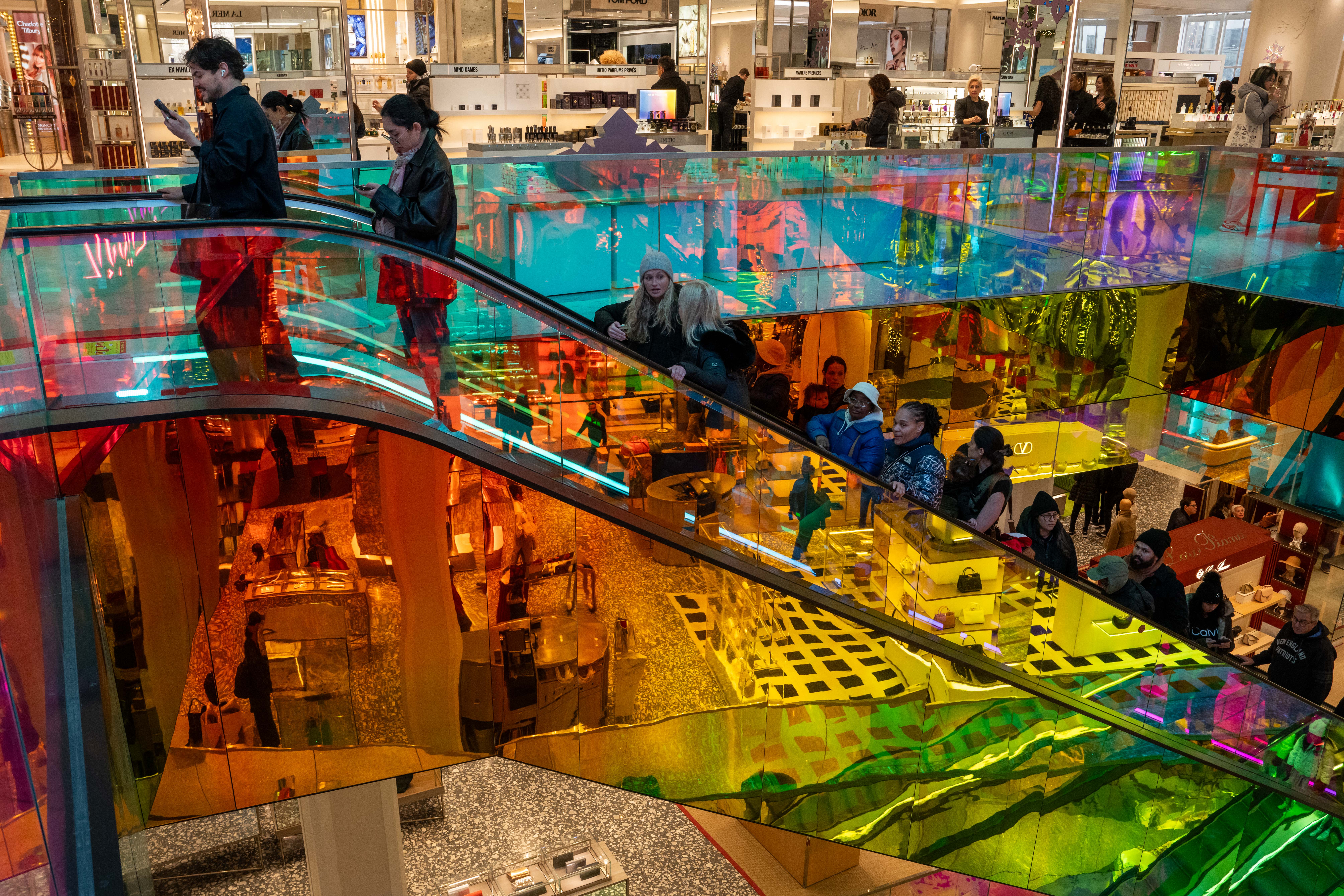 People shop in a department store.